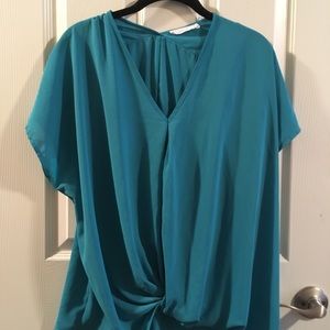 Robin’s egg blue blouse with tie detail at waist!